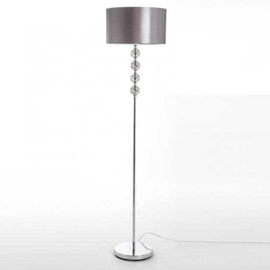 Lámpara de pie con base de acero y cristal