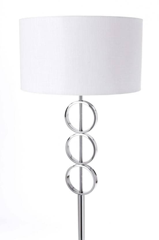 Lámpara de pie en blanco y metal con originales círculos en la base