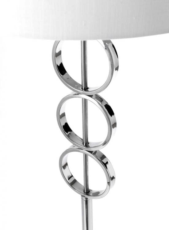 Lámpara de pie en blanco y metal con originales círculos en la base detalle