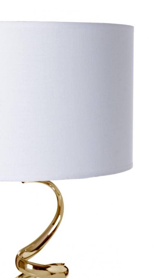Lámpara de mesa blanca y dorada con pie original con formas curvas irregulares detalle