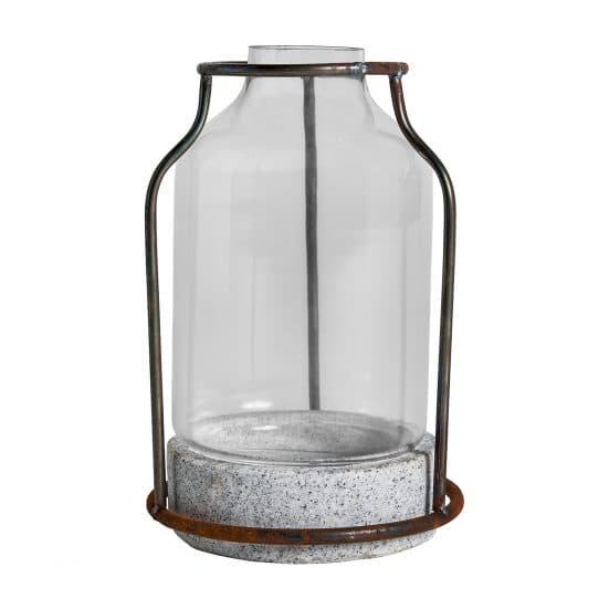 Portavela redondo, en color transparente, de estilo shabby chic. Fabricado en vidrio, combinado con piedra.