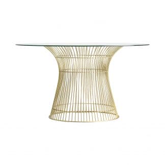 Mesa comedor reut, en color oro, de estilo art deco. Fabricado en hierro, combinado con cristal. Producto desmontable.