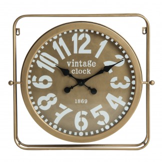 Reloj pared cuadrado angon, en color oro viejo, de estilo art deco. Fabricado en hierro, combinado con vidrio.