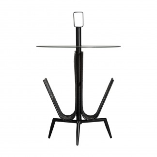 Mesa auxiliar fussen, en color negro, de estilo art deco. Fabricado en hierro, combinado con vidrio. Producto desmontable.