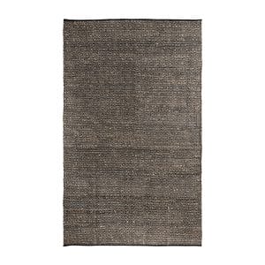 Alfombra rectangular elara, en color negro, de estilo vintage. Fabricado en yute, combinado con algodón.