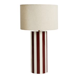 Lámpara de sobremesa Riley de estilo contemporáneo, fabricado en hierro en color burdeos con acabado brillo, combinado con algodón en color beige. Producto desmontable.